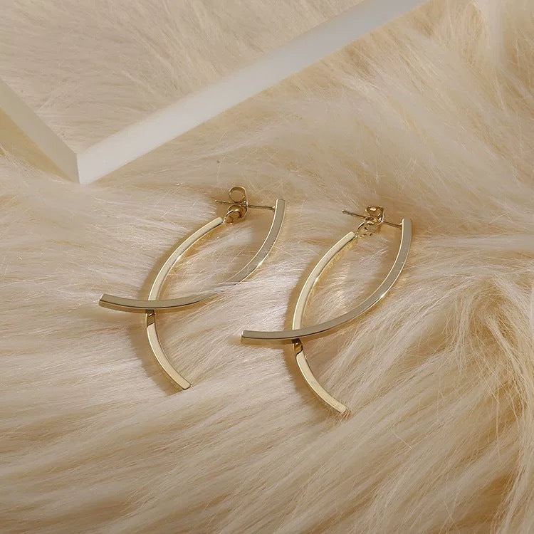 Brincos Longos Cruzados